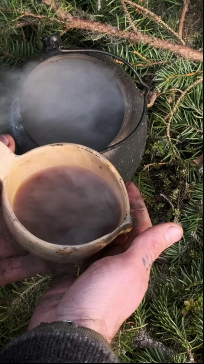Wild tea brewed over the fire