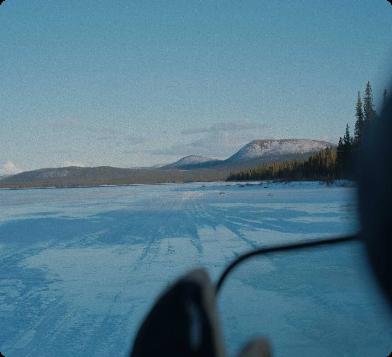 Frozen lake seen from a snowmobile