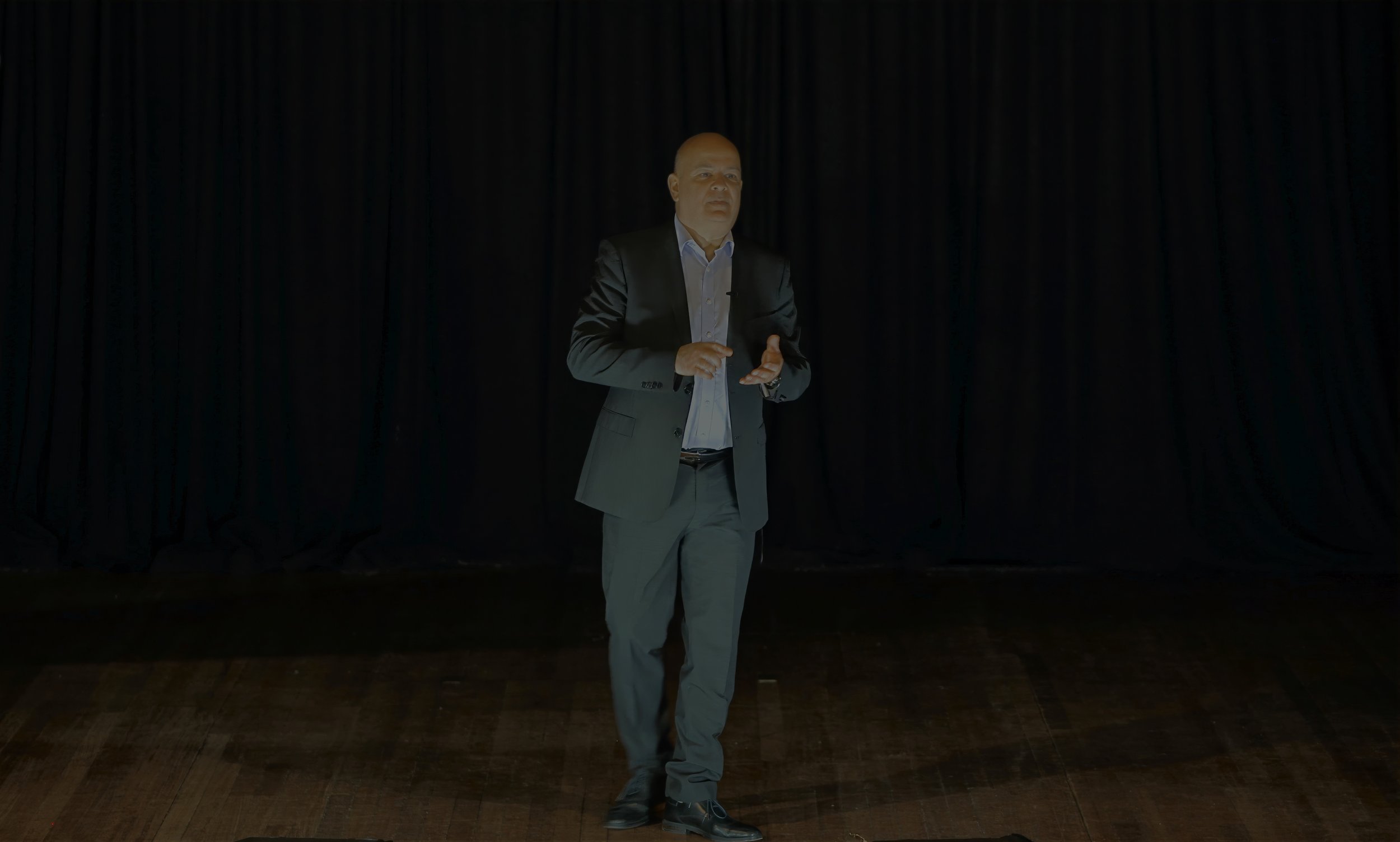 Olivier Guitta speaking on stage