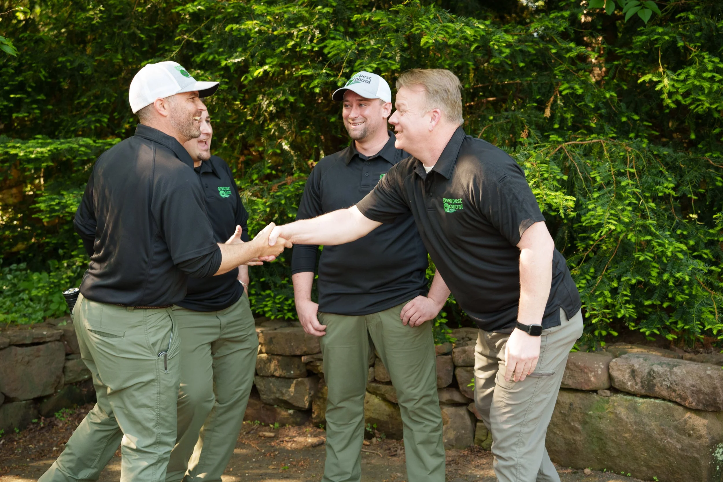 The Green Pest Control team greeting each other