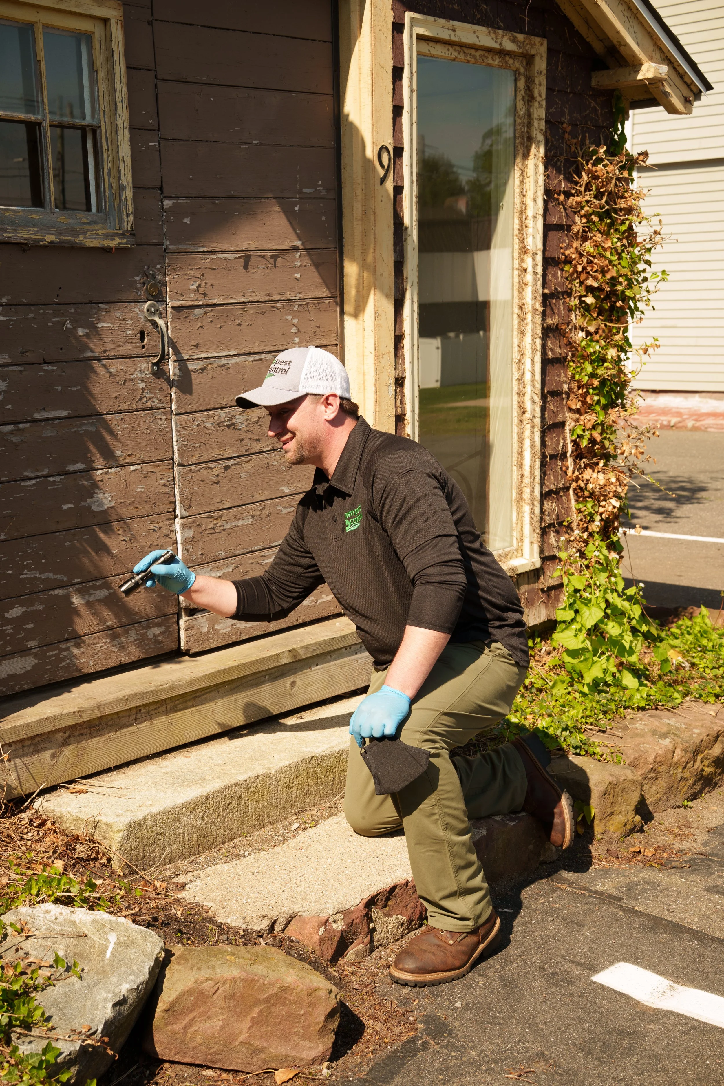 Technician performing a free exterior evaluation