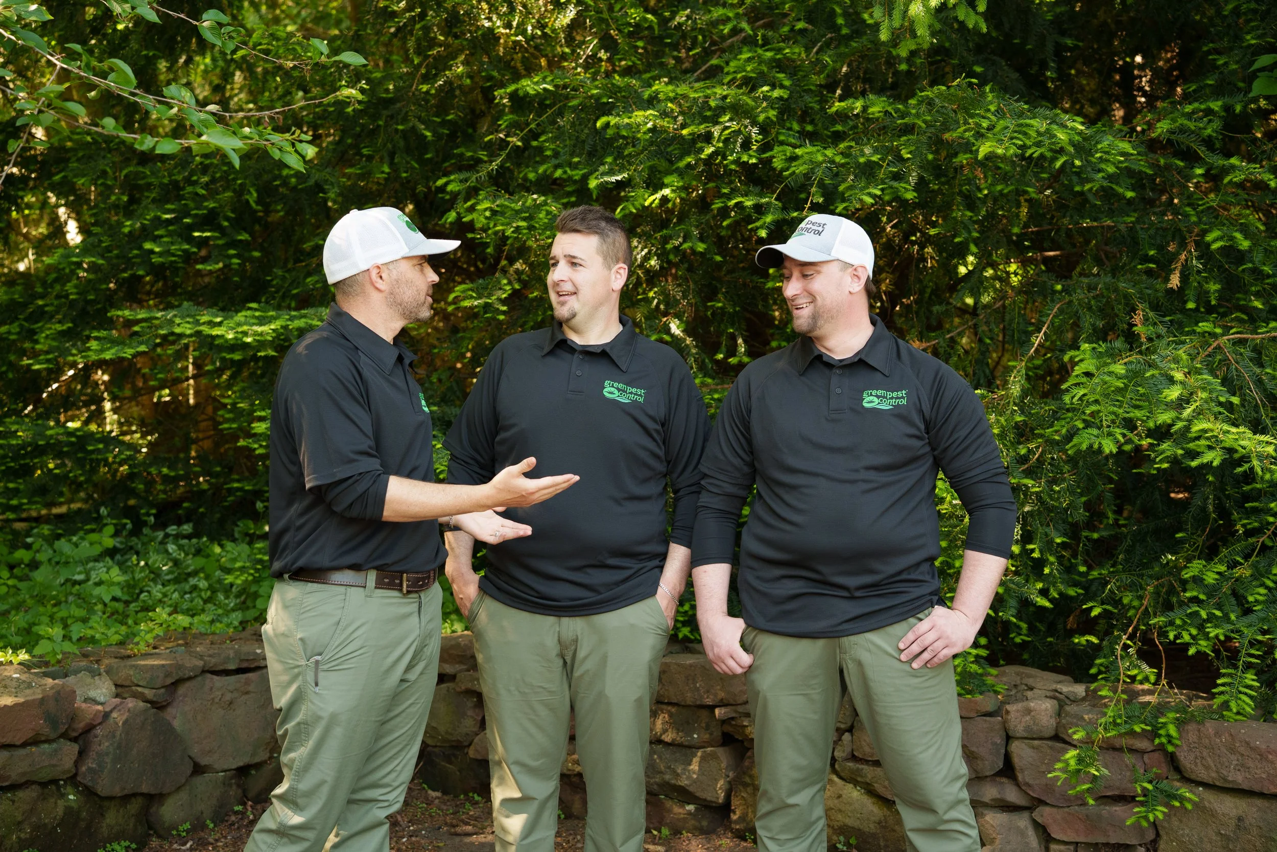 The Green Pest Control team talking through a job