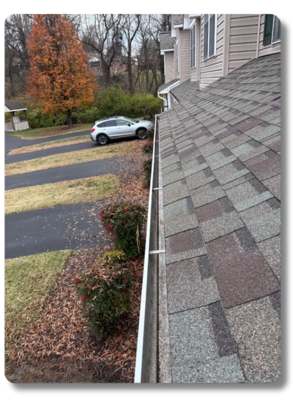 Hot Shot Pressure Washing clean gutters aerial view of residential home in Roanoke Valley VA
