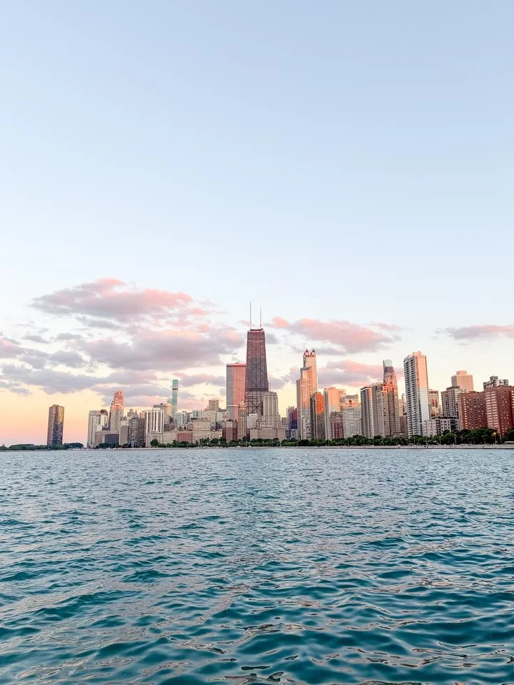 Chicago skyline over Lake Michigan at sunset