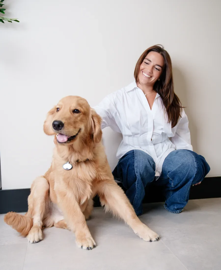 Leslie Cantillo with her therapy dog at The Healing Vine Counseling, Miami