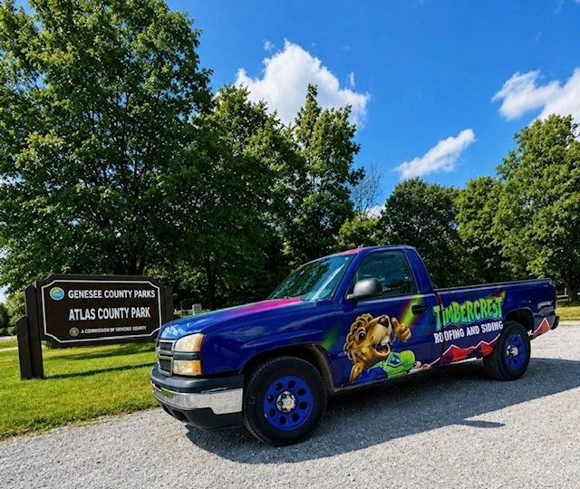 Timbercrest mascot on branded apparel and signage