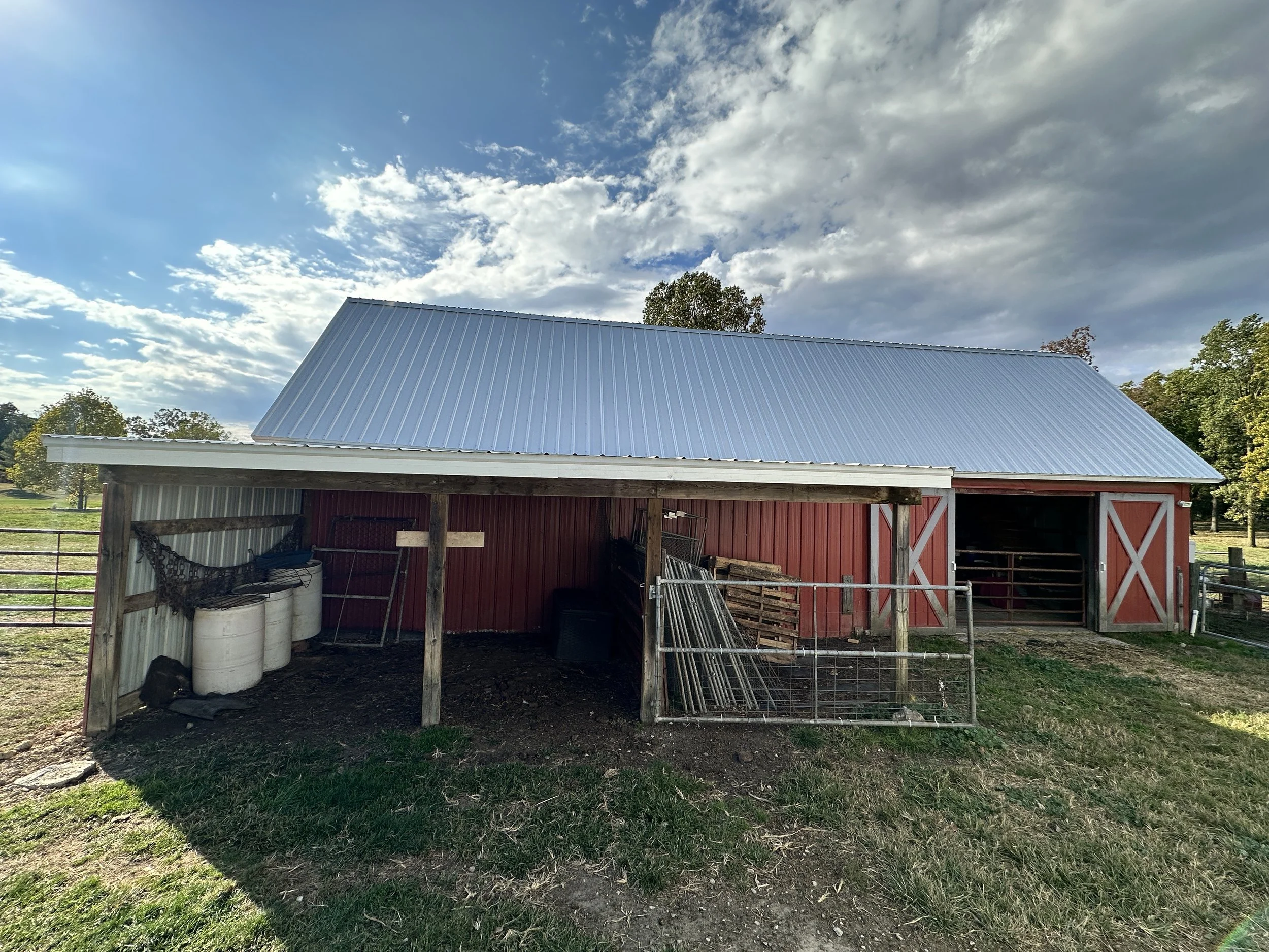 Metal tile roof with soffit and gutters