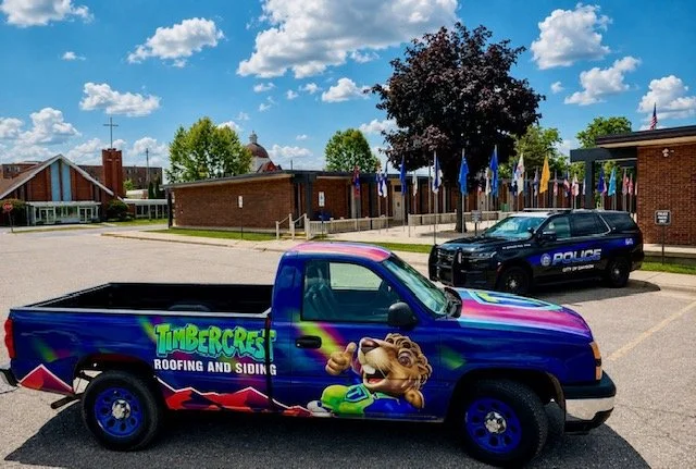Timbercrest mascot on branded apparel and signage