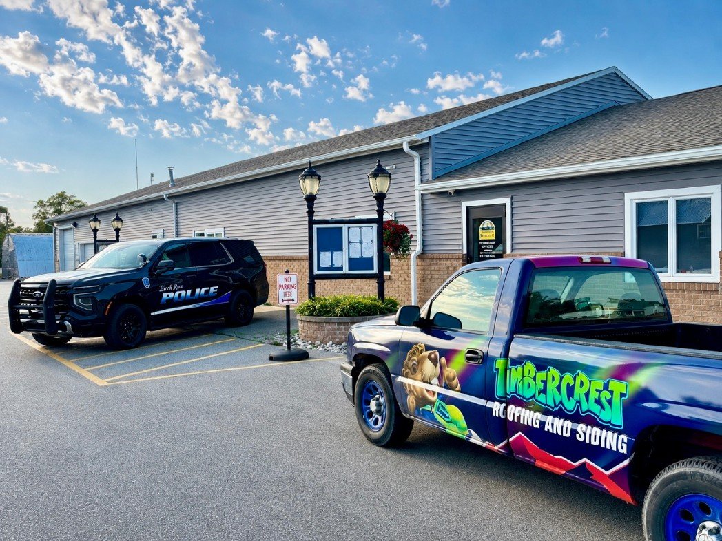 Timbercrest mascot on branded apparel and signage