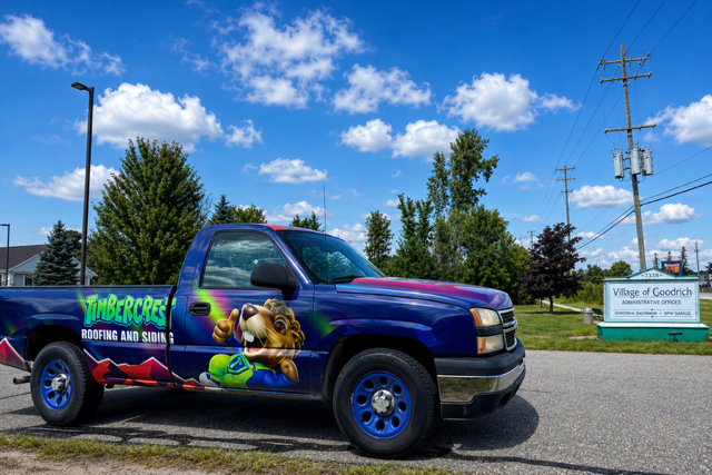 Timbercrest mascot on branded apparel and signage