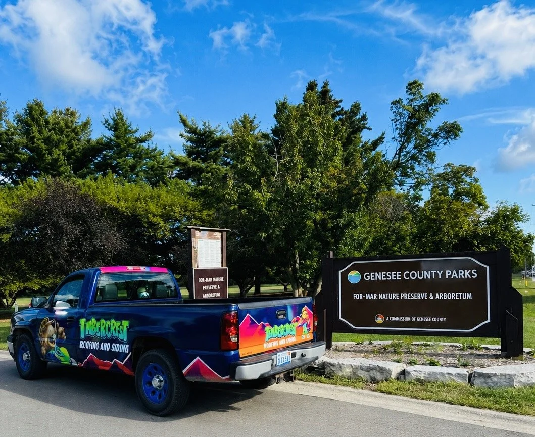 Timbercrest mascot on branded apparel and signage