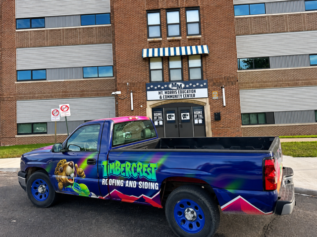 Timbercrest mascot on branded apparel and signage