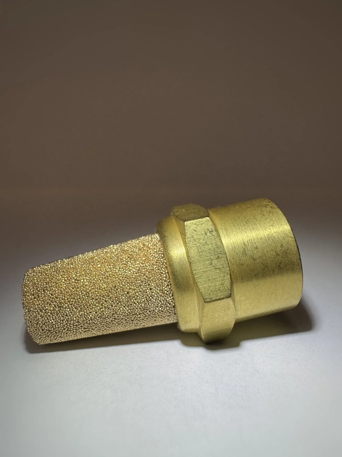 Angled view of the Perfect Purge hex brass body with brite-dip finish.