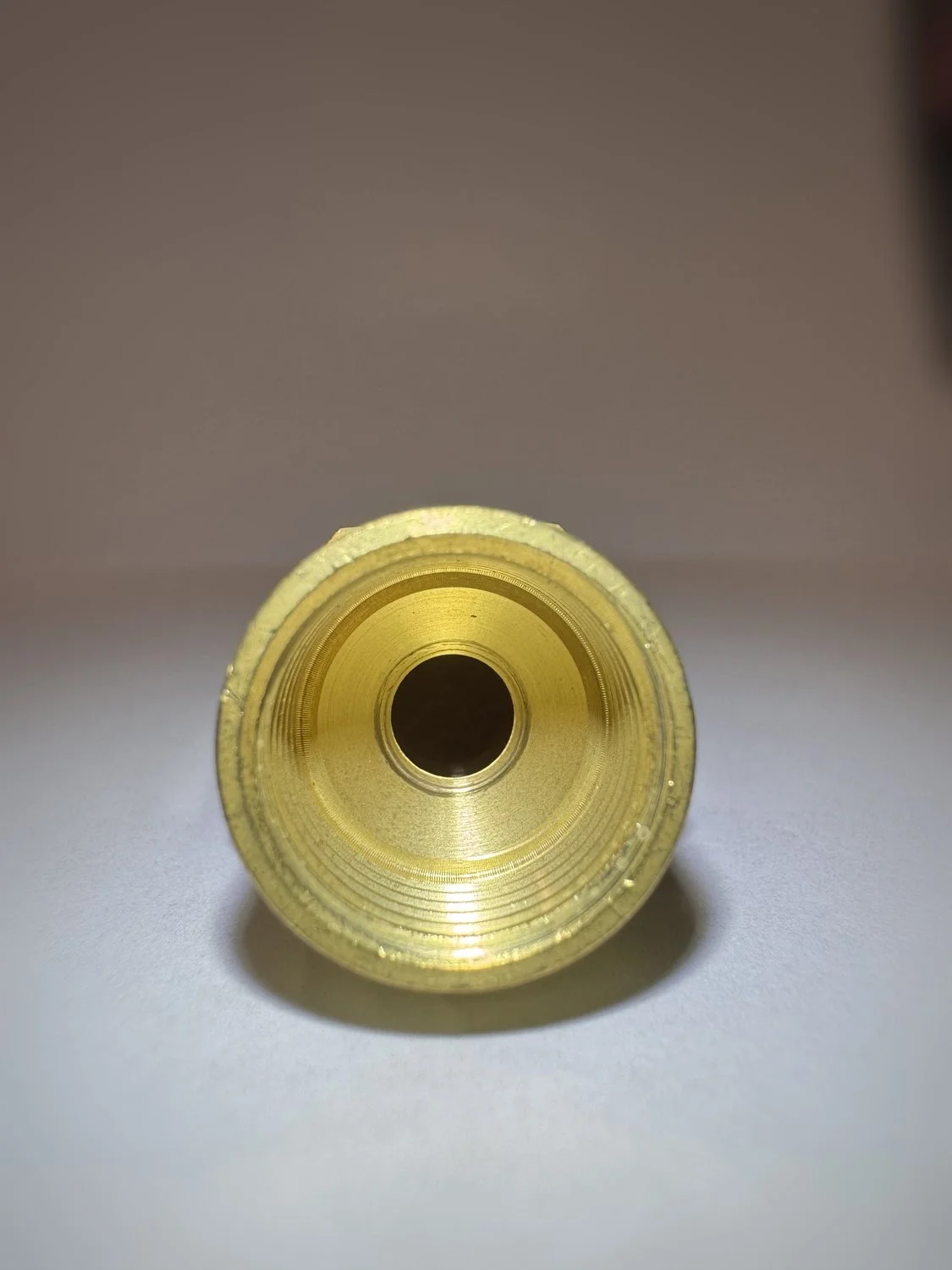 End view of the Perfect Purge showing the 5/8-18 right-hand female thread and machined taper seat.