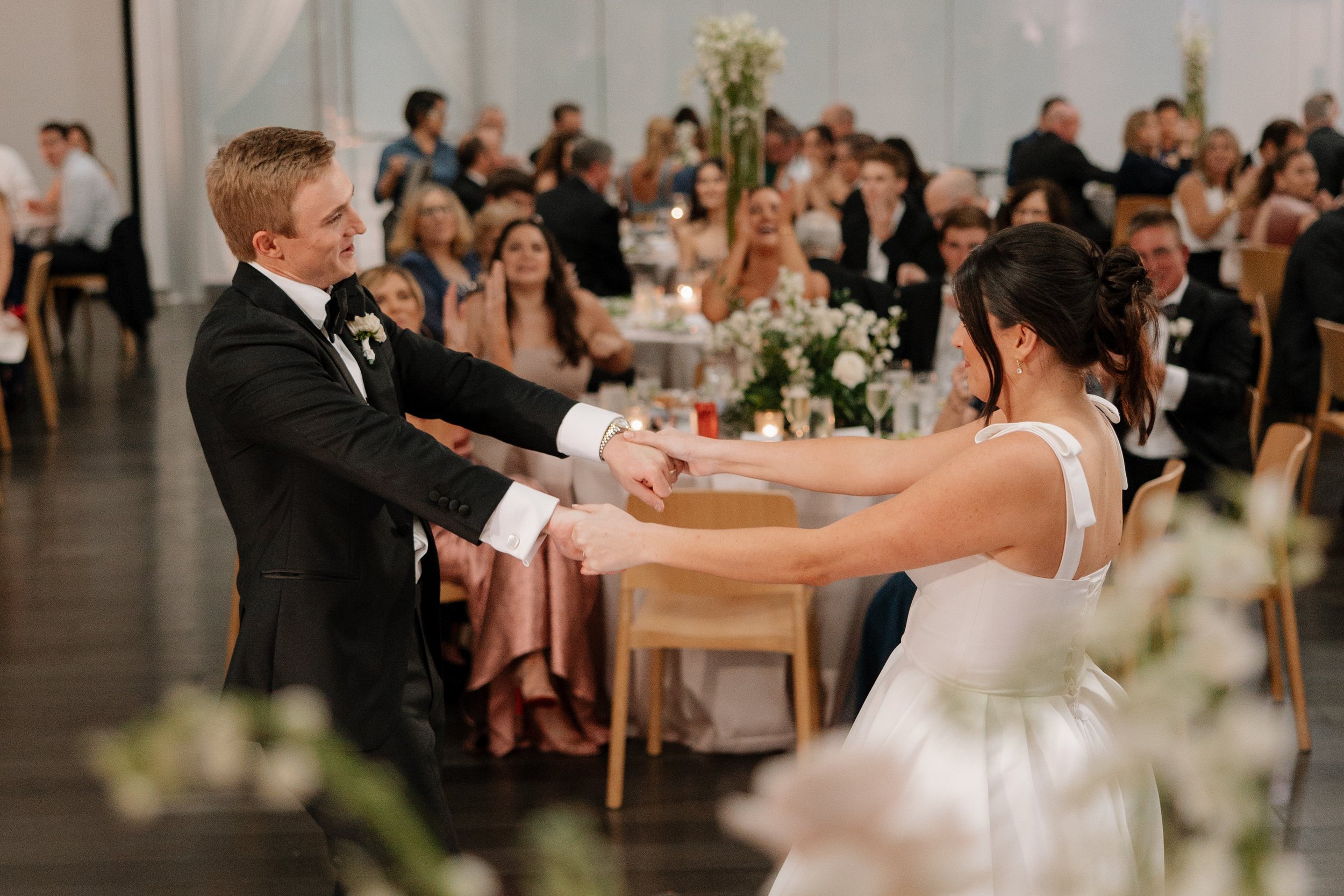 Wedding guests celebrating on the dance floor