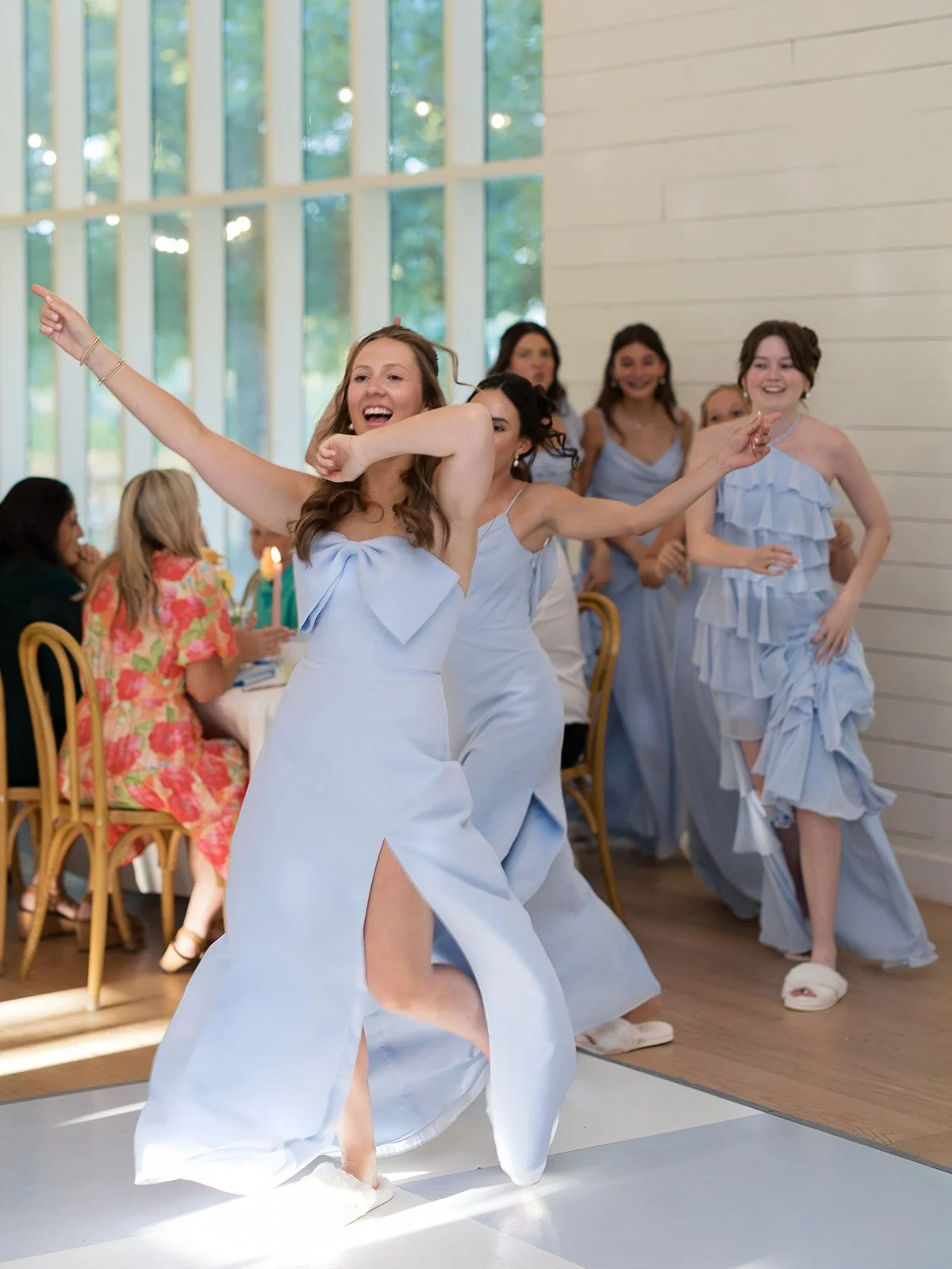 Wedding guests dancing together