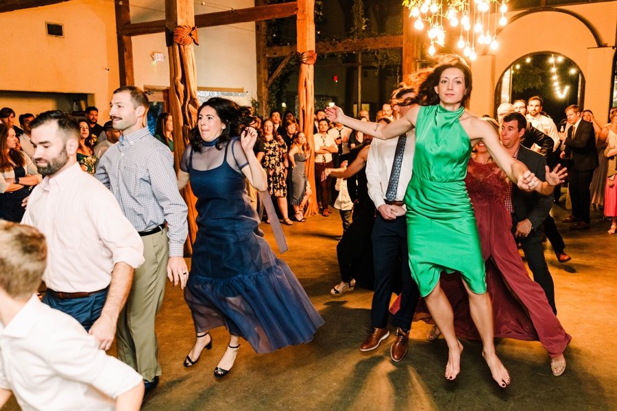 Wedding guests dancing together