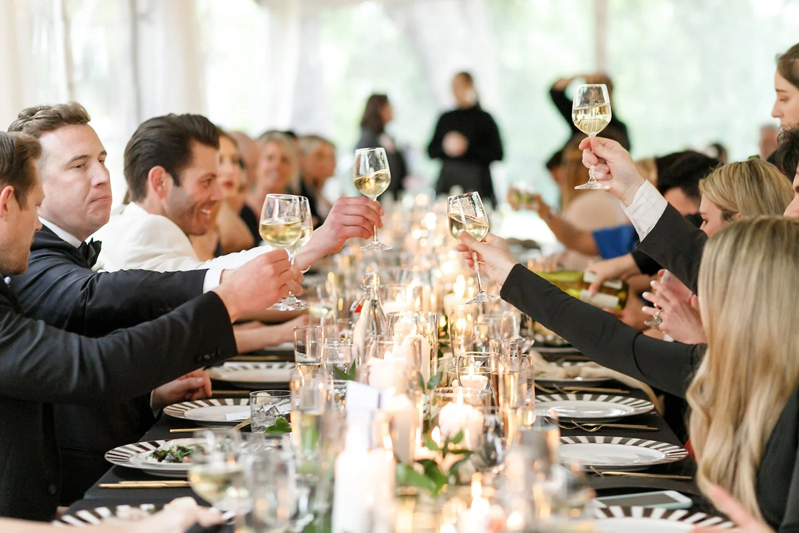 Wedding guests celebrating on the dance floor