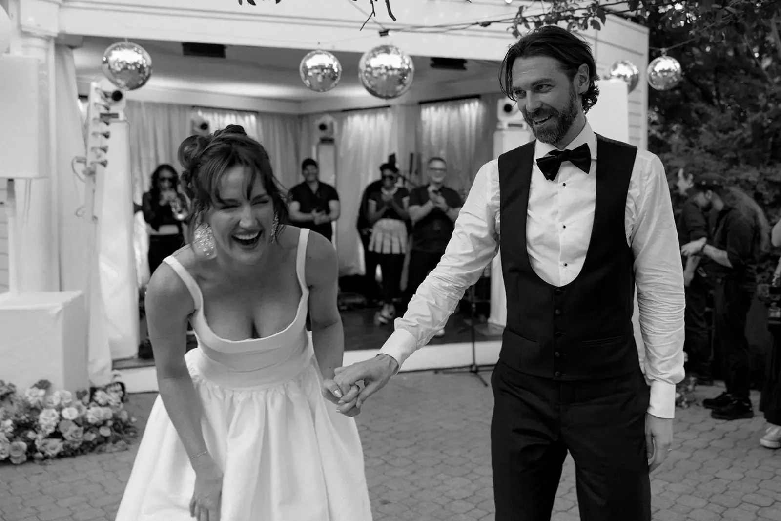 Wedding guests celebrating on the dance floor