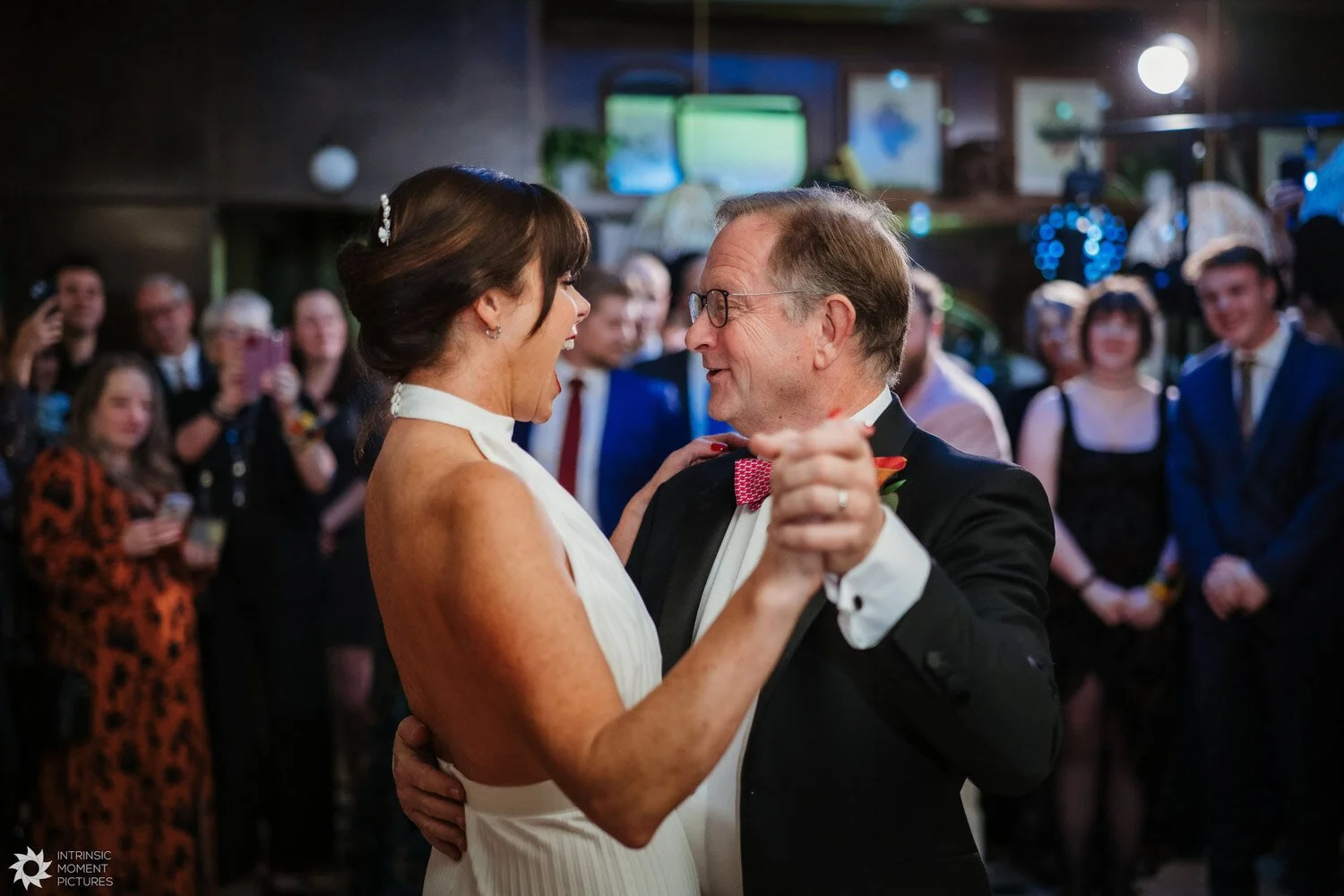 Wedding guests dancing together