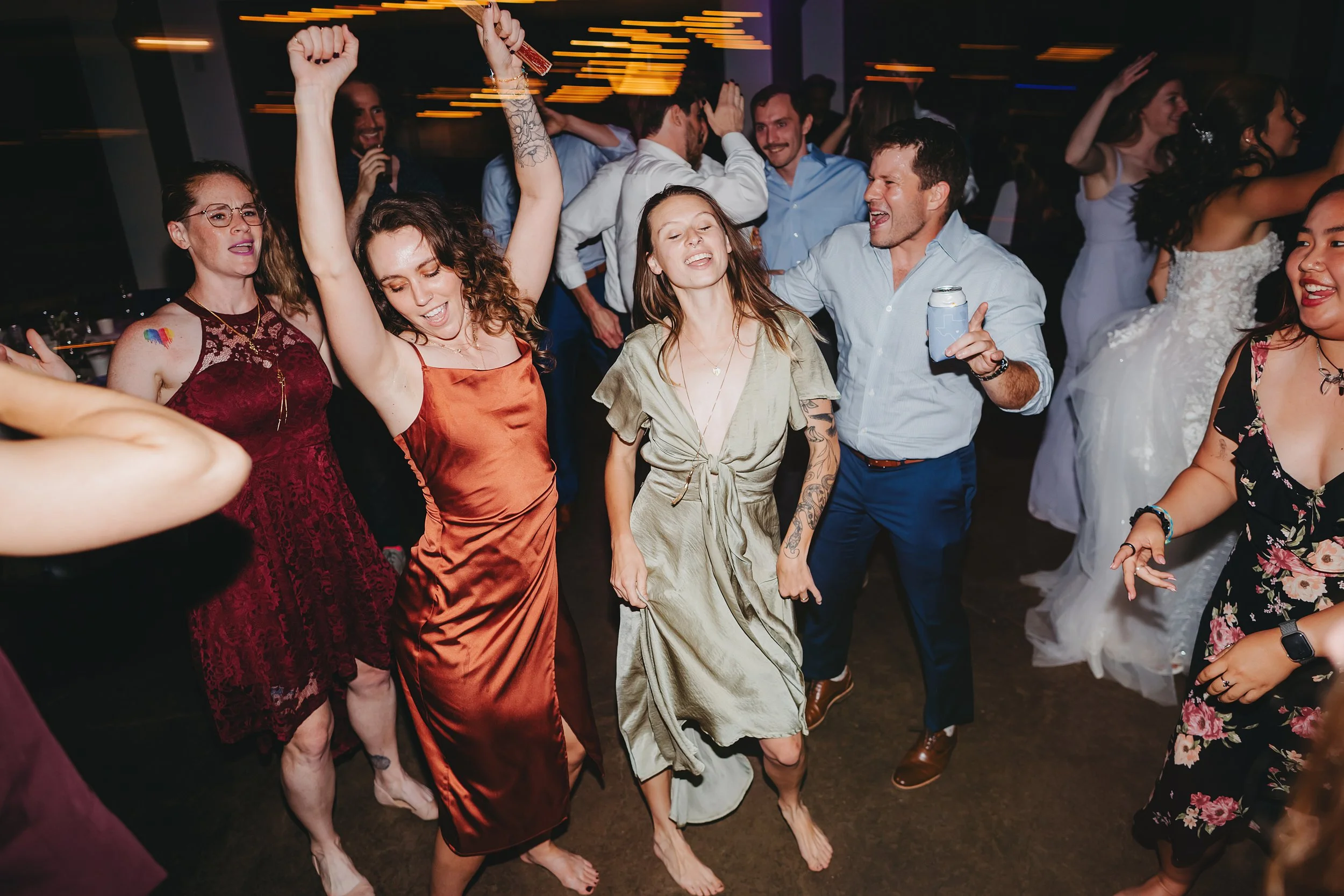 Wedding guests dancing together