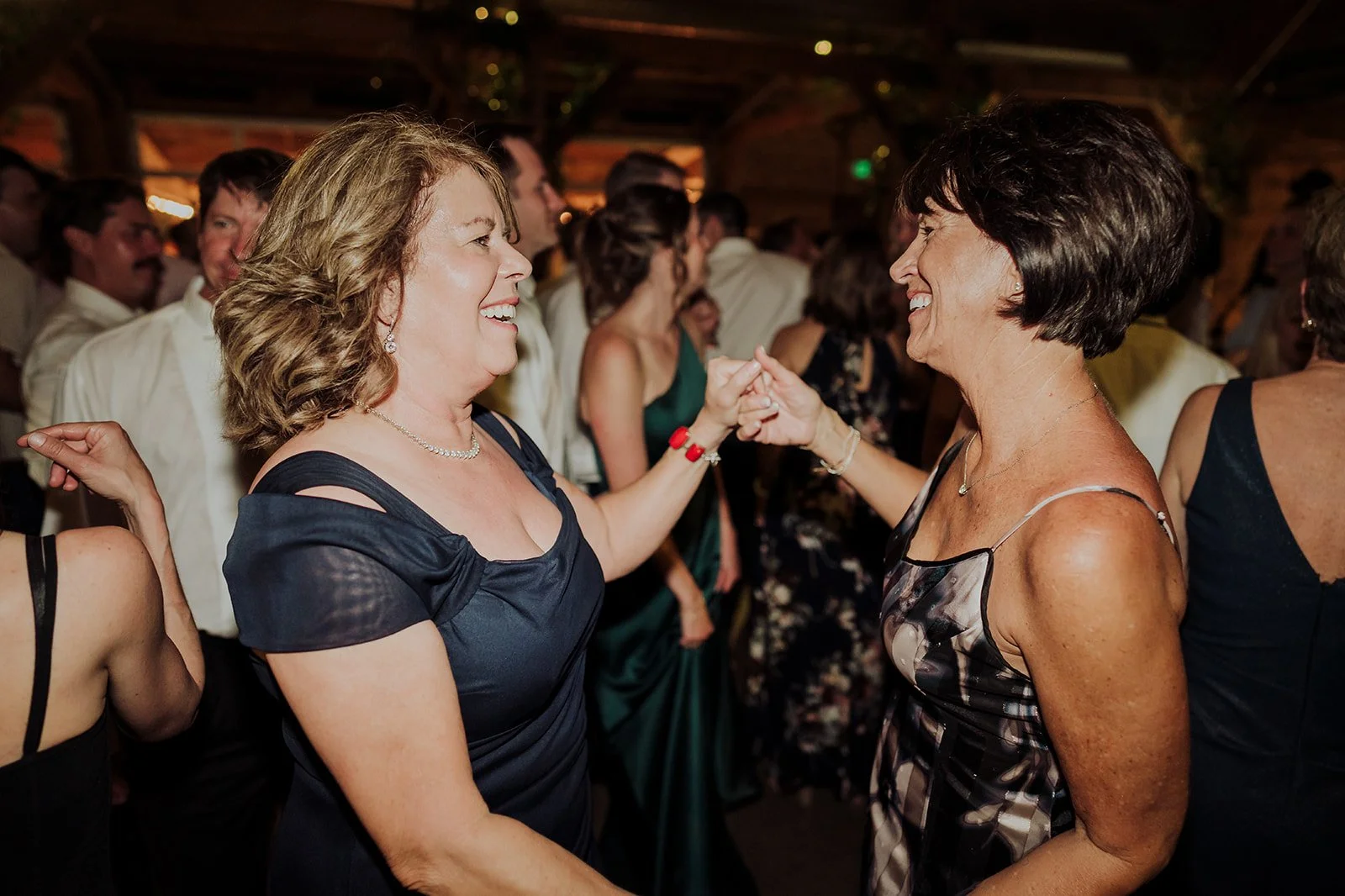 Wedding guests dancing together