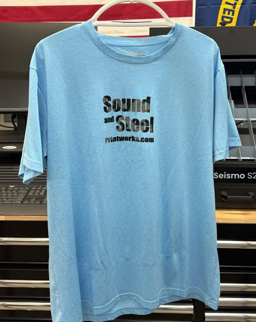 Light blue tee, front print
