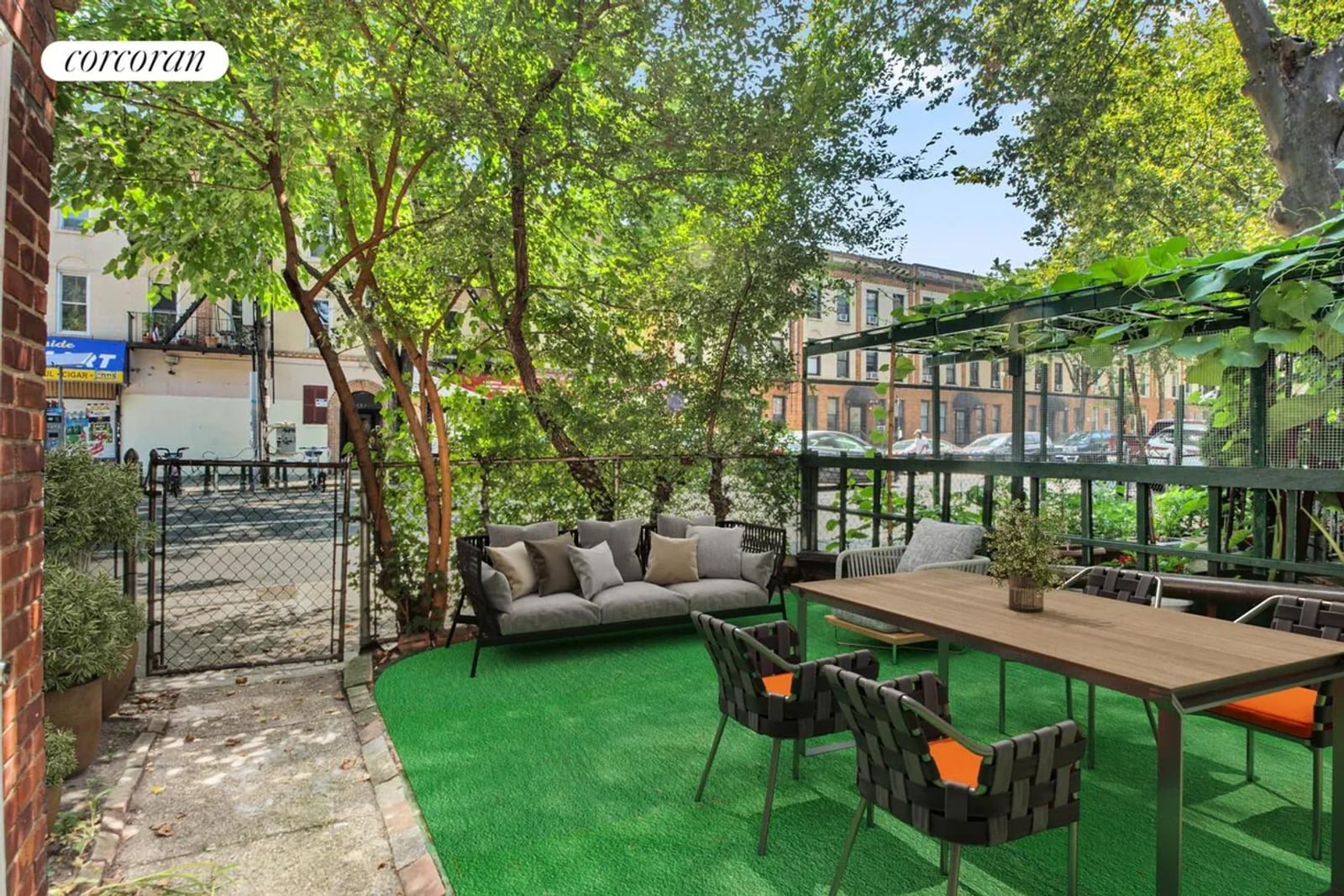 Private garden patio beneath mature trees