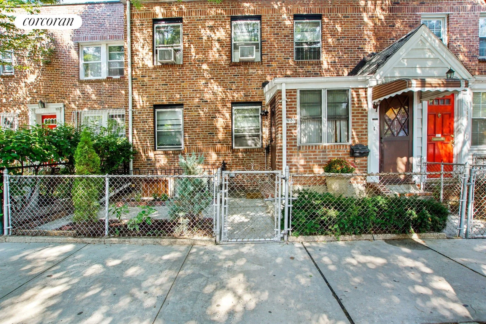 Brick row house façade on 47th Street
