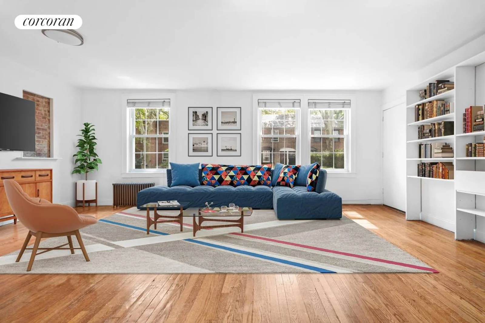 Sunlit living room with built-in shelving