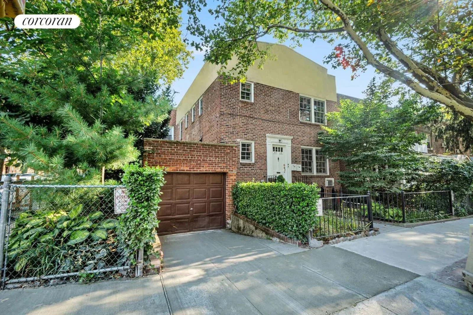 Type D brick end house with garage and planted frontage