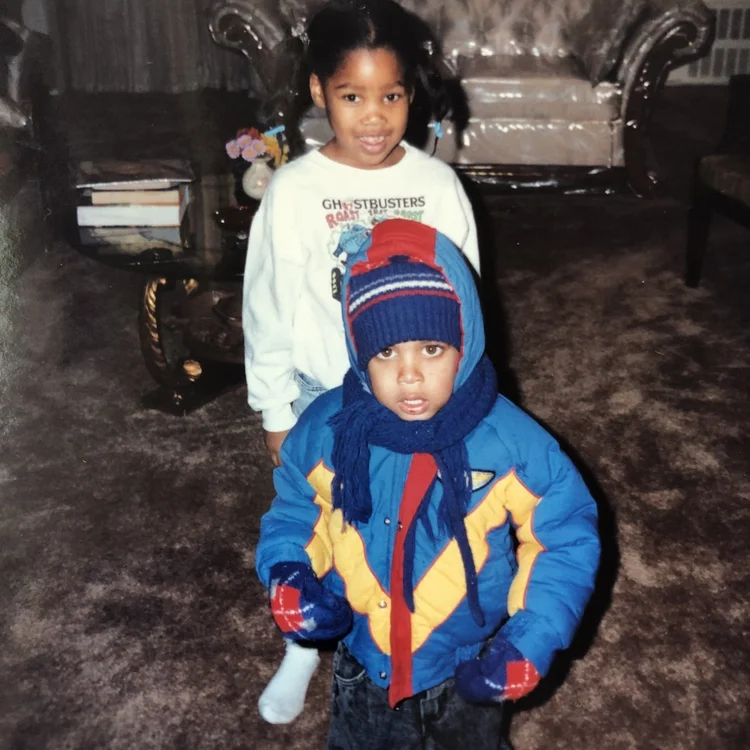 A childhood photograph of Rashad and his cousin Kelly.