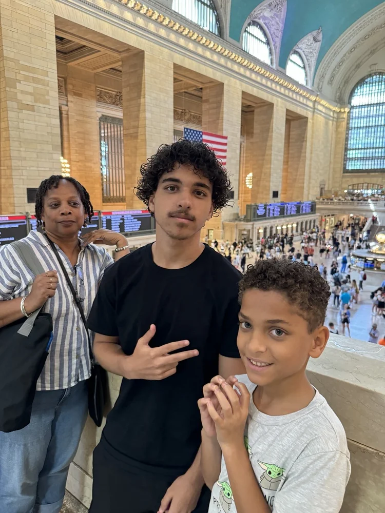 Rashad’s mother and his sons Omari and Aidan overlooking Grand Central’s main concourse.