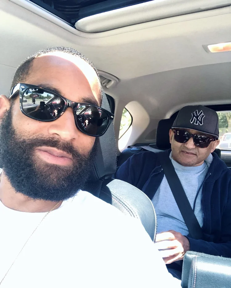 Rashad Houston with his dad, both wearing sunglasses. The last time Rashad saw him.