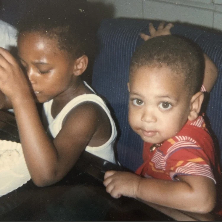 Rashad as a baby with his brother
