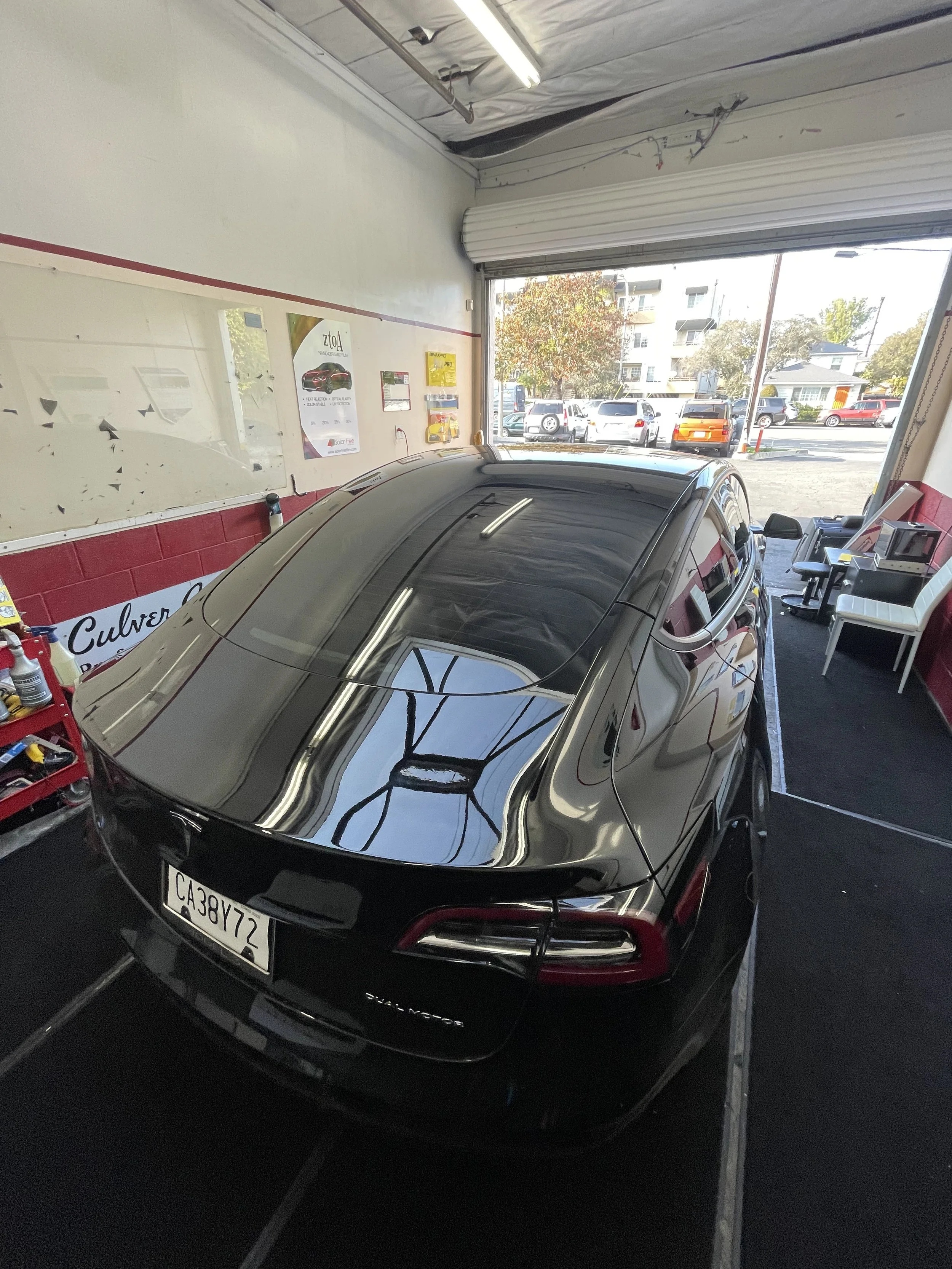 Completed automotive window tinting