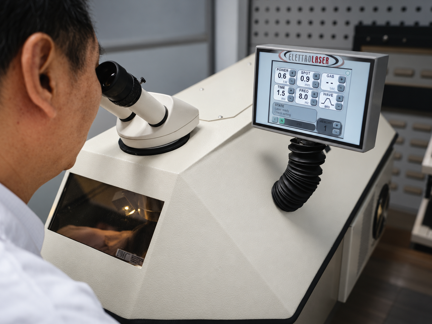 Watchmaker operating the ELETTROLASER laser welding machine at Meridian