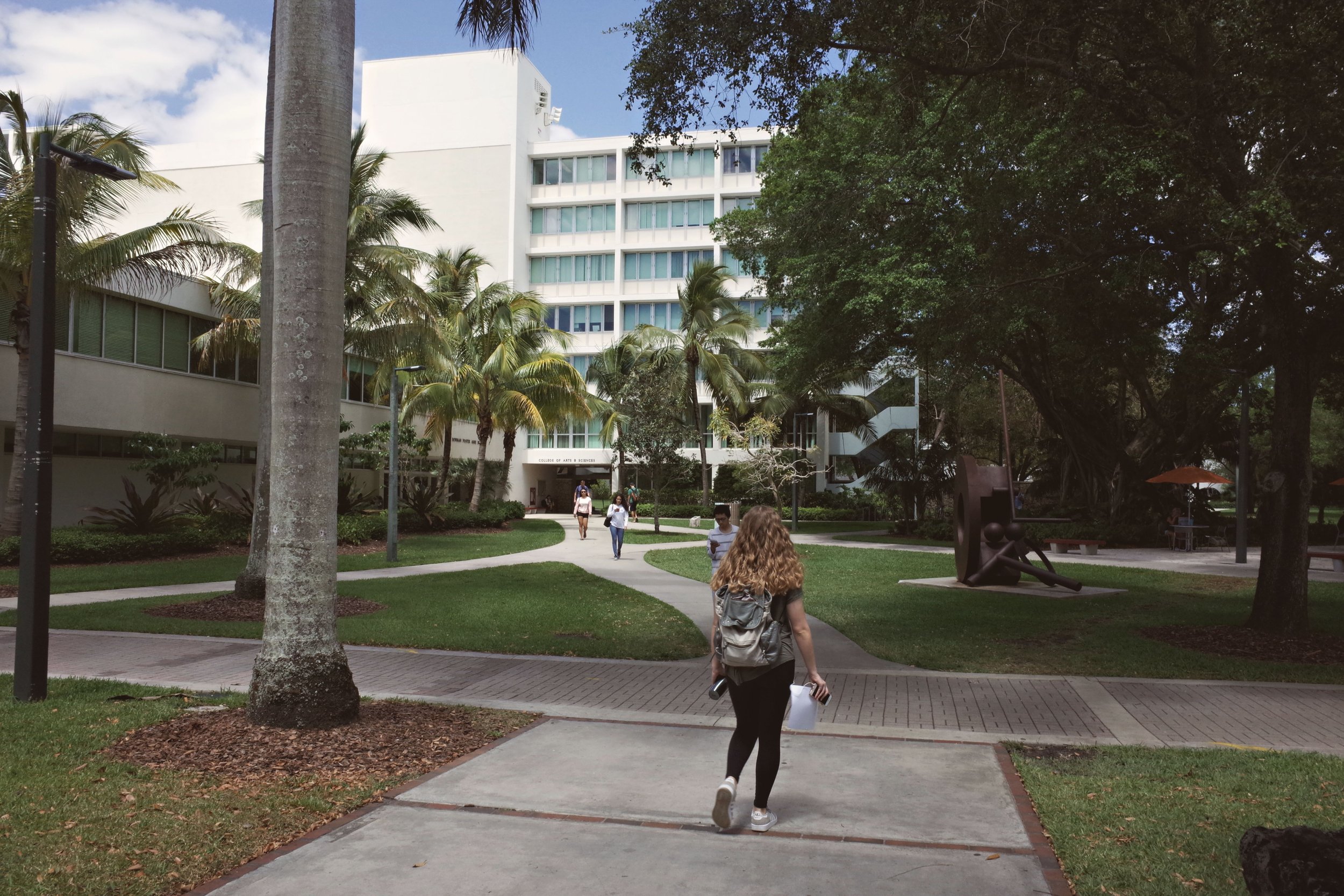 A college campus with students walking between buildings