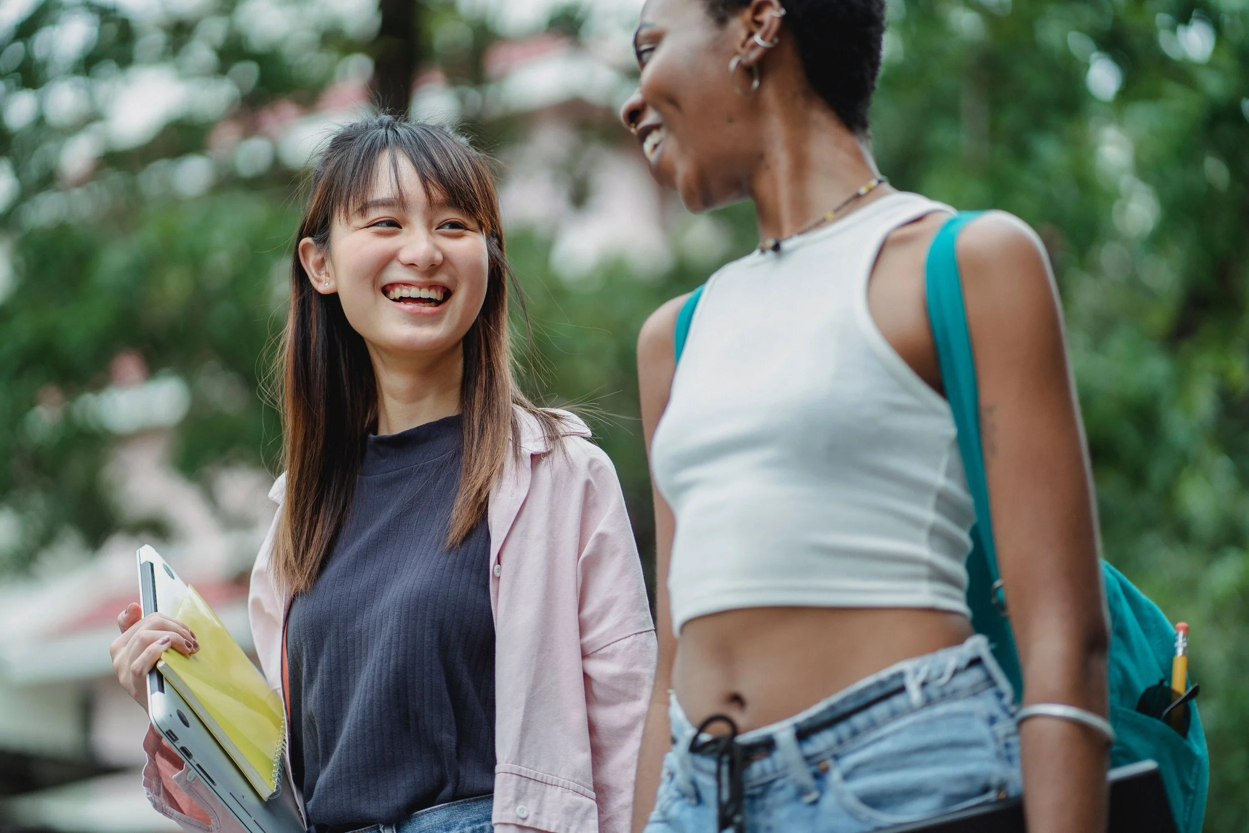 College students walking and talking on campus