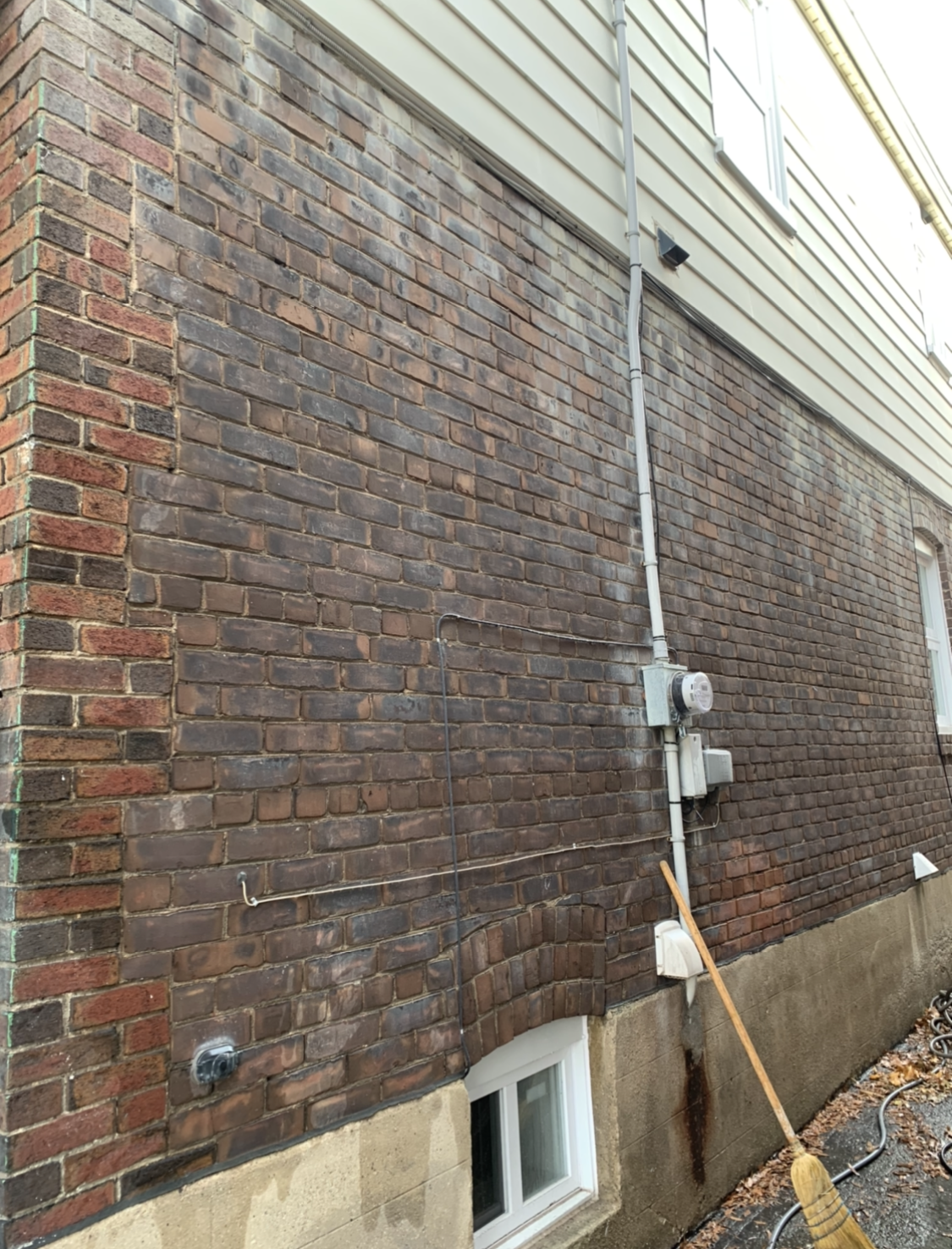 Brick wall before cleaning