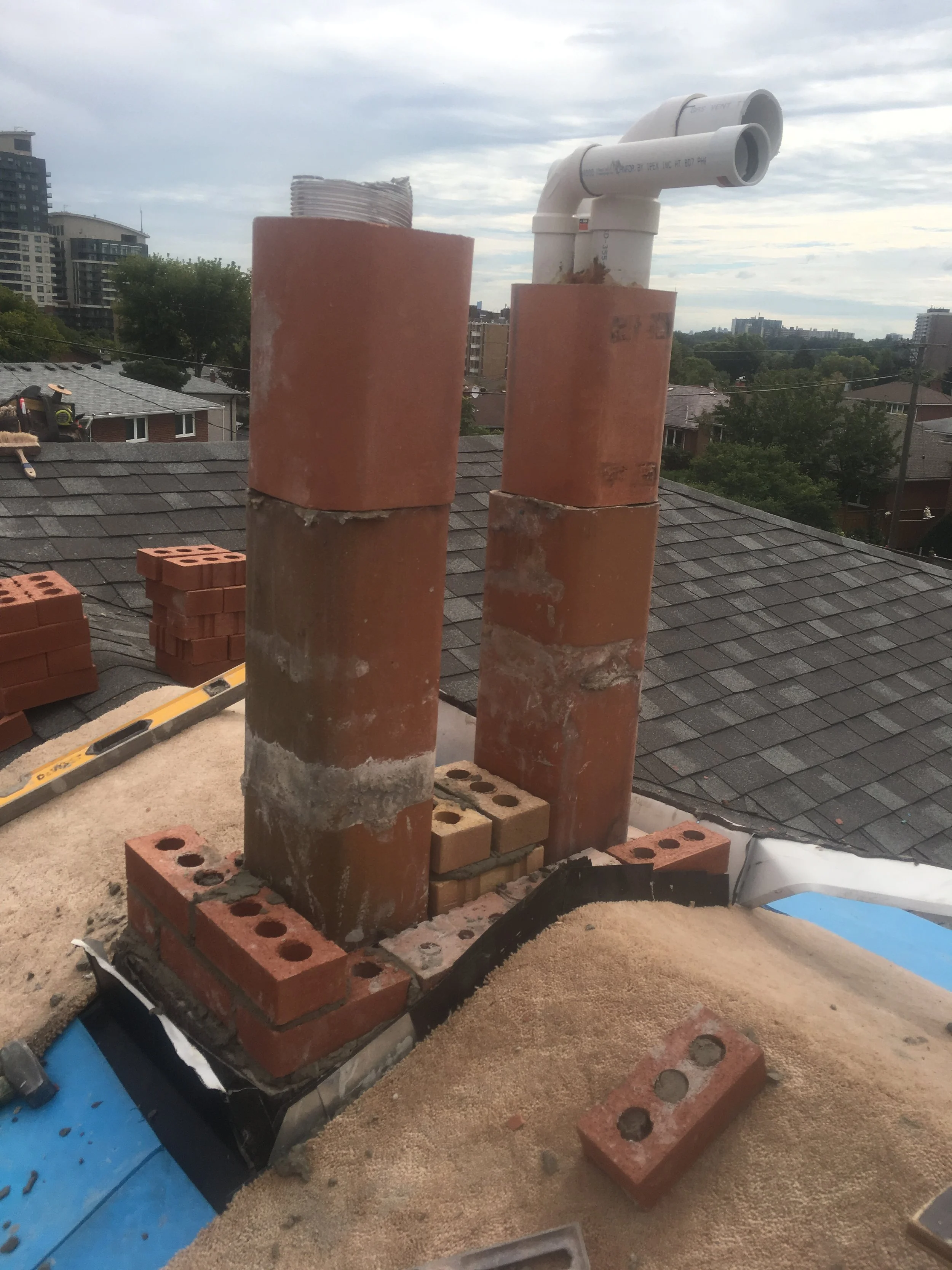 Twin chimney rebuild – Brick Aid Masonry