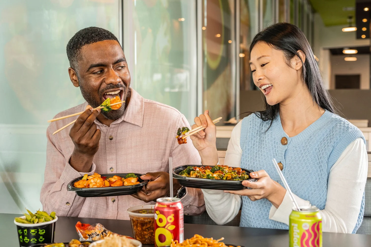 Two friends eating MÓGŪ together in the restaurant