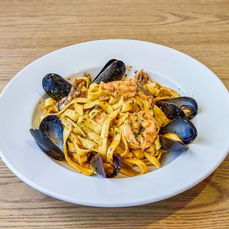 Seafood pasta with shrimp, calamari and mussels