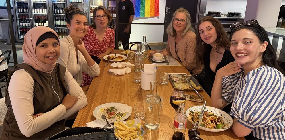 Six members at a dinner