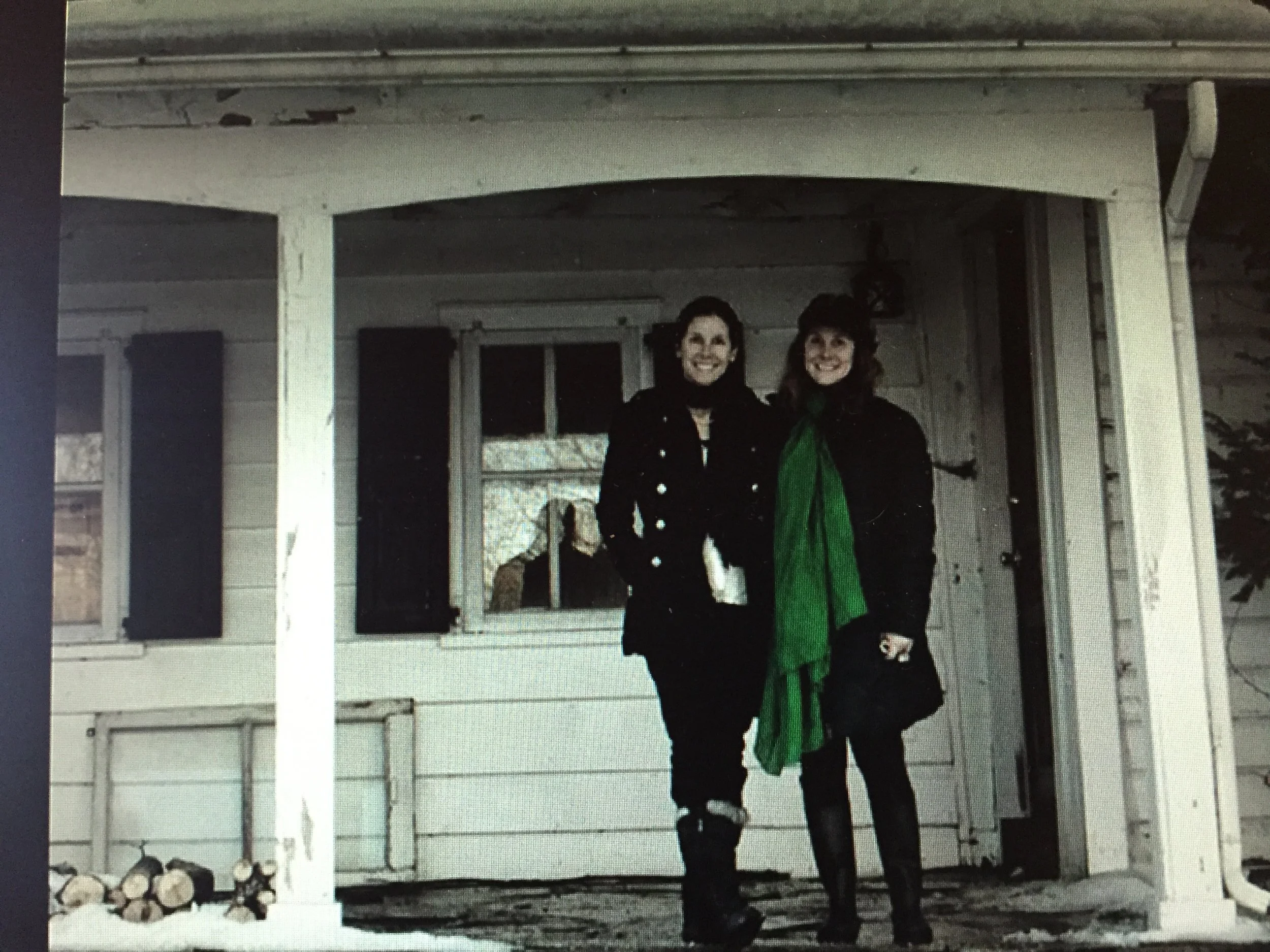 Melisca and Dana Klisanin on the porch of their Rhinebeck house