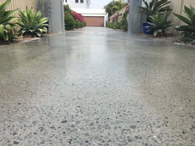 Honed concrete driveway by Surface Haus