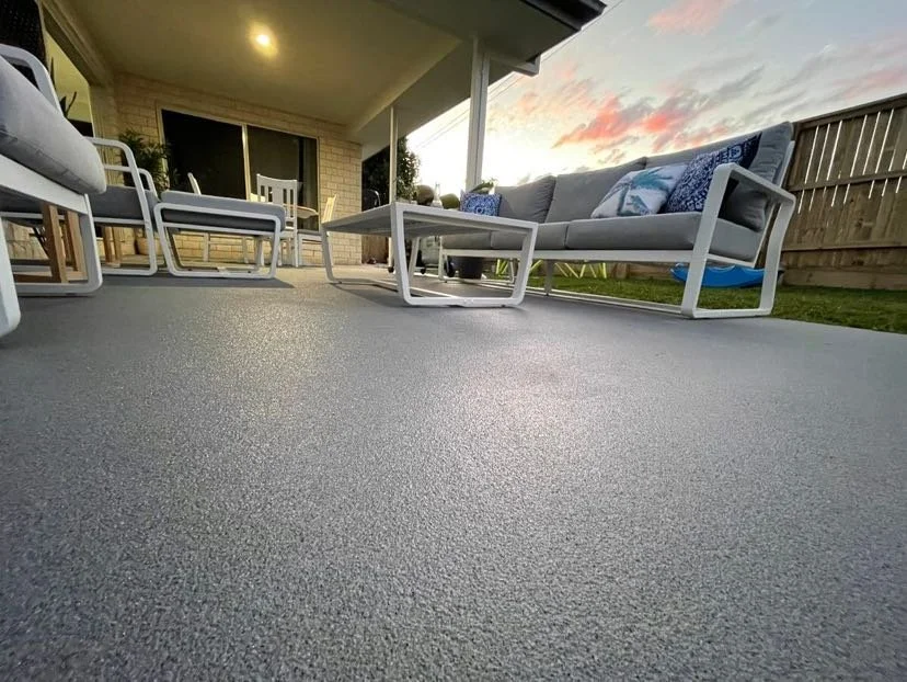 Resurfaced outdoor entertaining area by Surface Haus