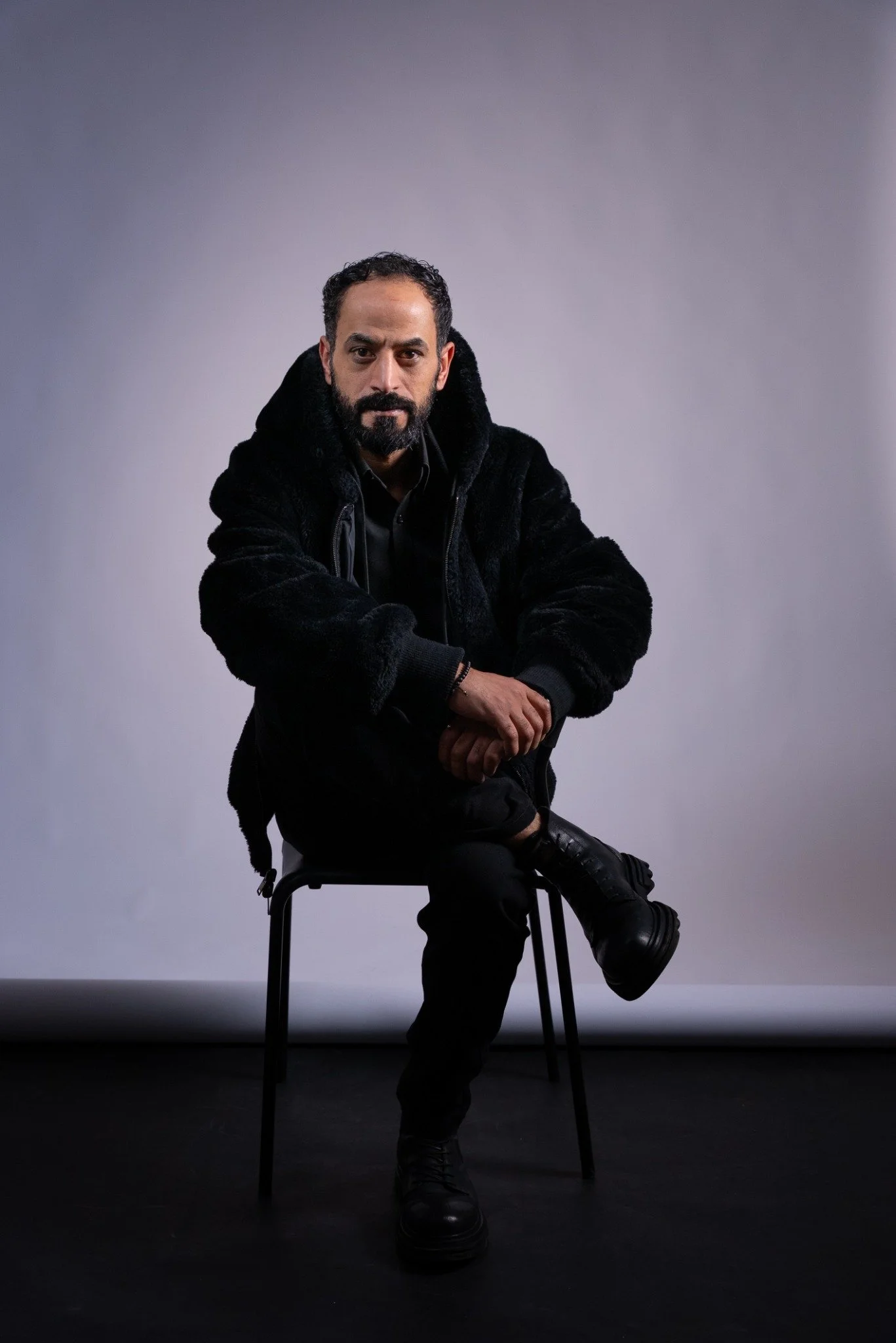 Eyad Hourani original portrait in a black jacket