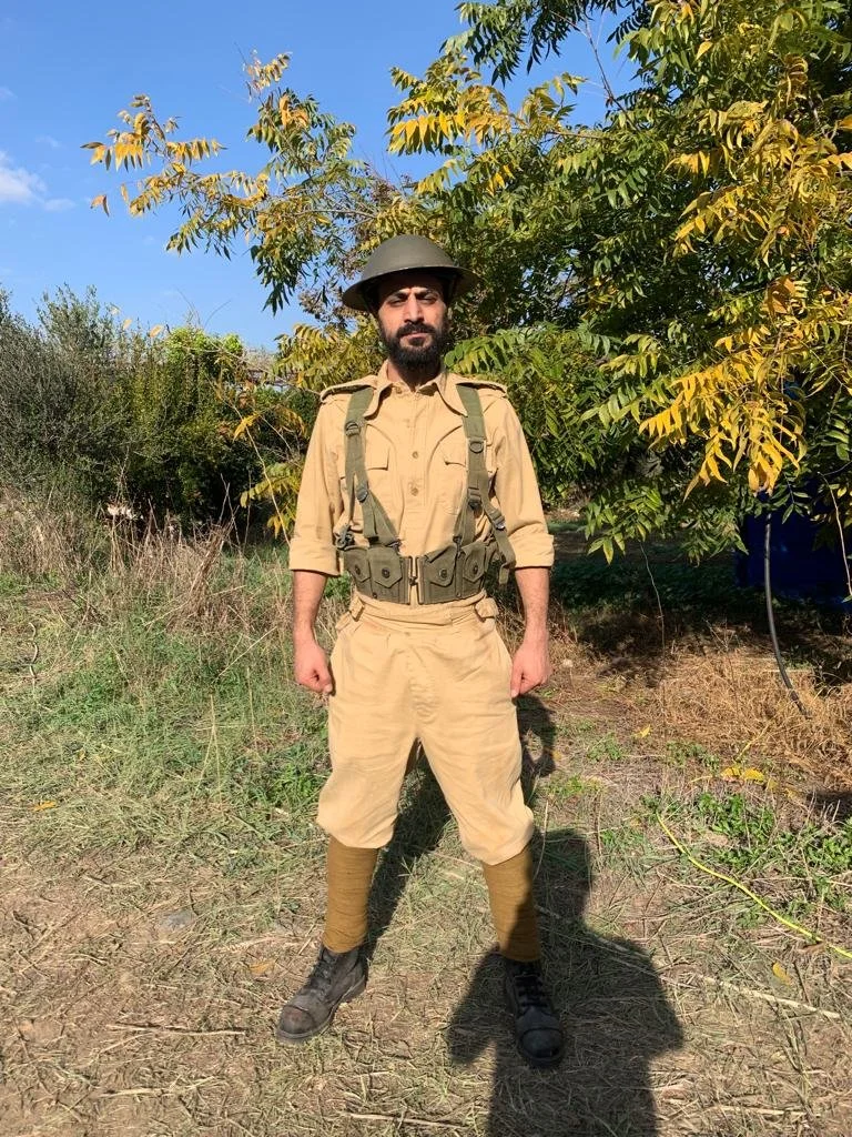 Eyad Hourani in costume on the set of All That’s Left of You