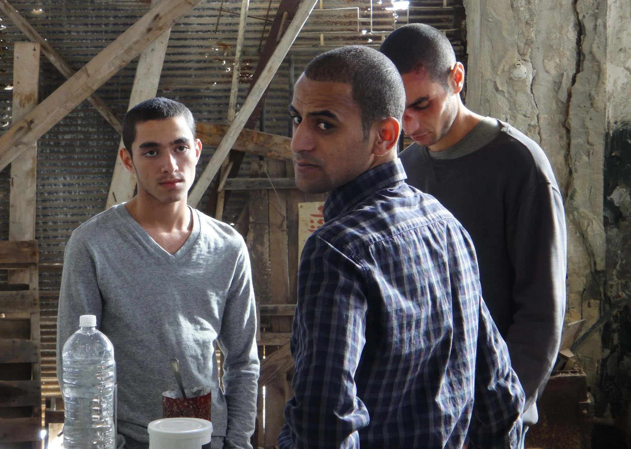 Eyad Hourani in a serious scene with the cast — Omar